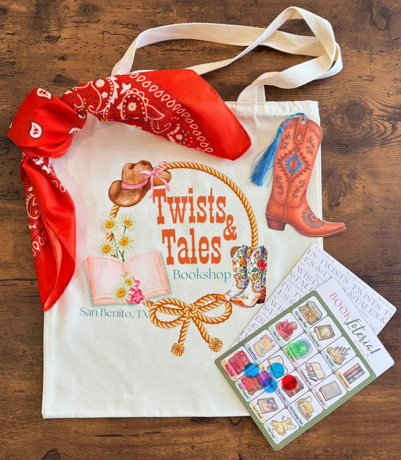 The Boots & Books limited-edition Book Lotería tote, styled with a book and a cowboy boot.